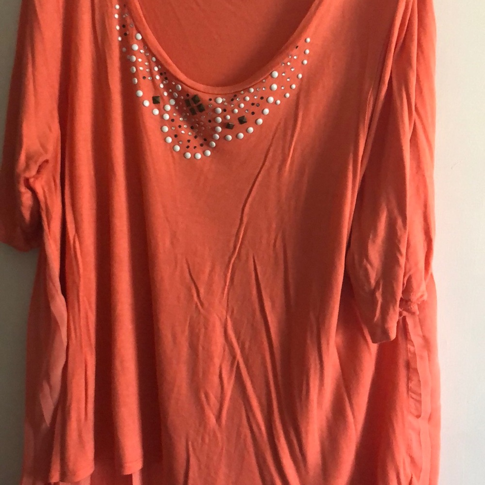 Beautiful orange shirt pleated back